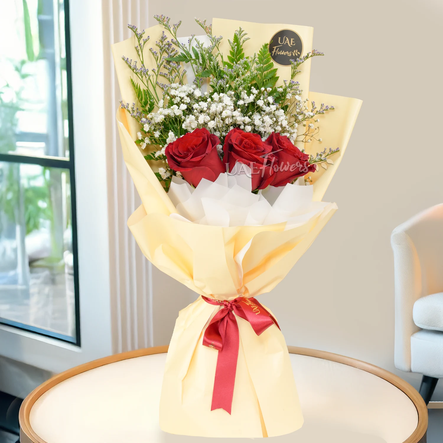 Bouquet of 3 red roses with green & baby's breath fillers in nice wrapping, 1 kg black forest cake with 5 latex balloons.