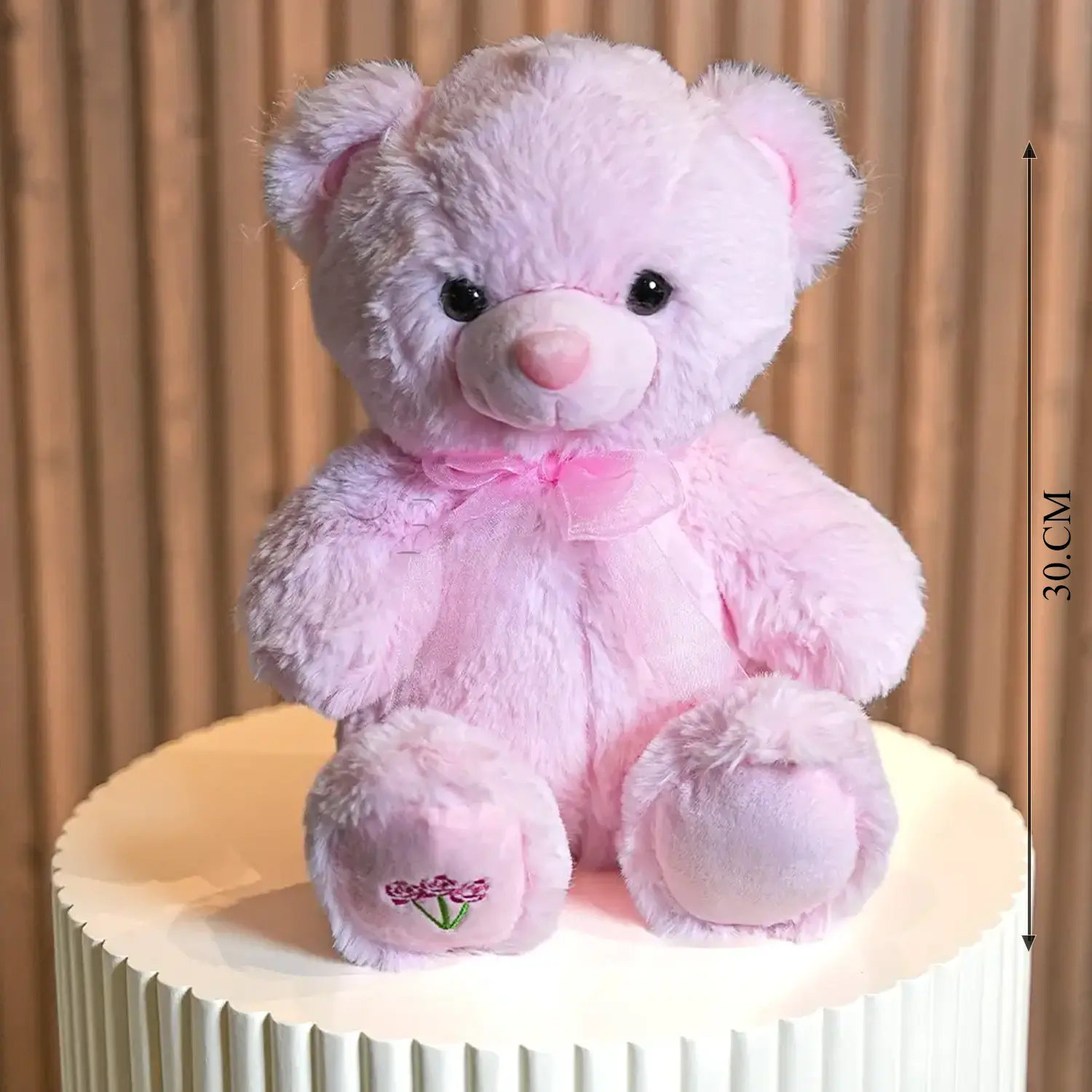 Bouquet of 12 pink carnations with limonium & green fillers in paper packing tied with ribbons, small pink teddy bear and BABY GIRL foil balloon.