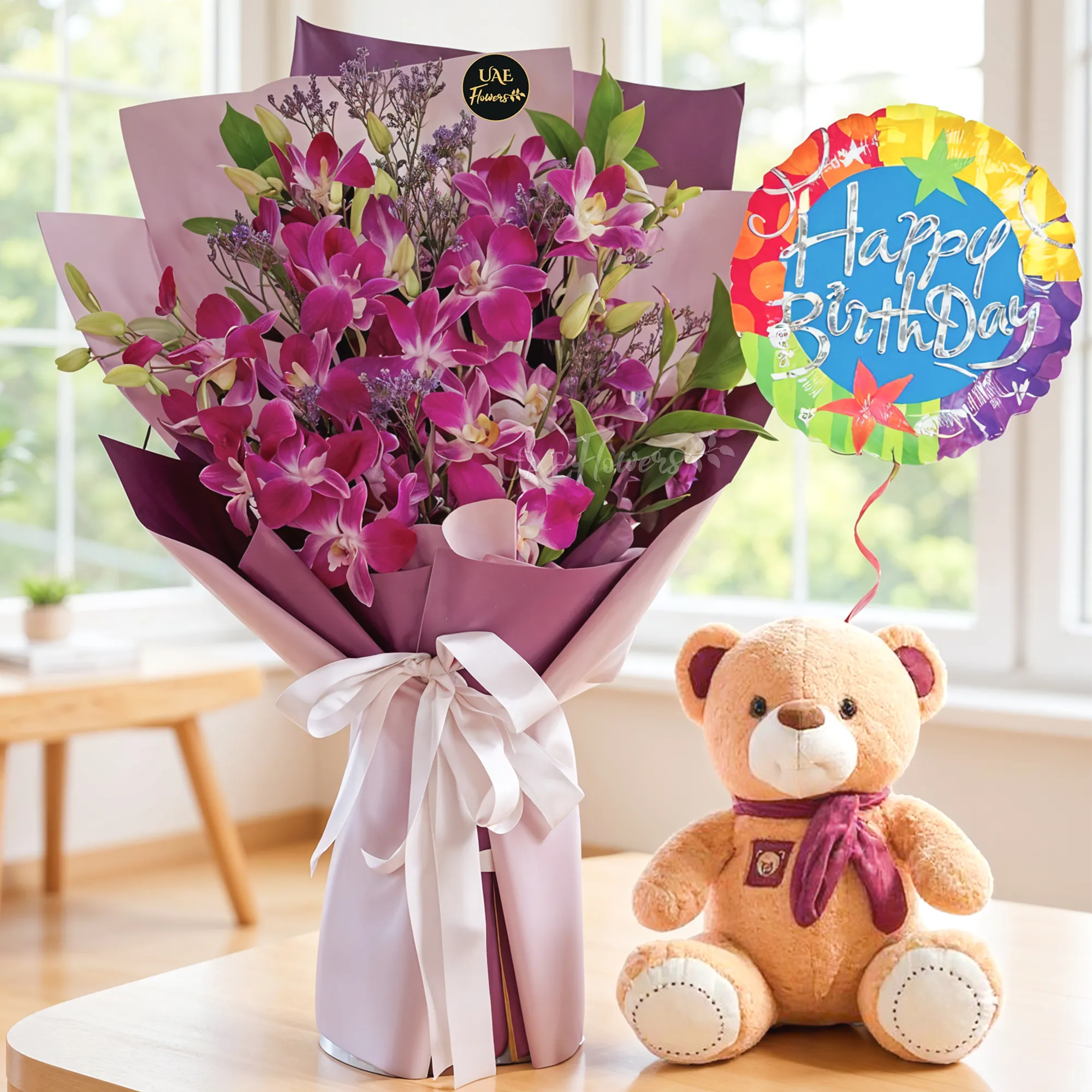 Bouquet of 10 purple orchids with green fillers in nice wrapping, a small teddy bear and HAPPY BIRTHDAY foil balloon.