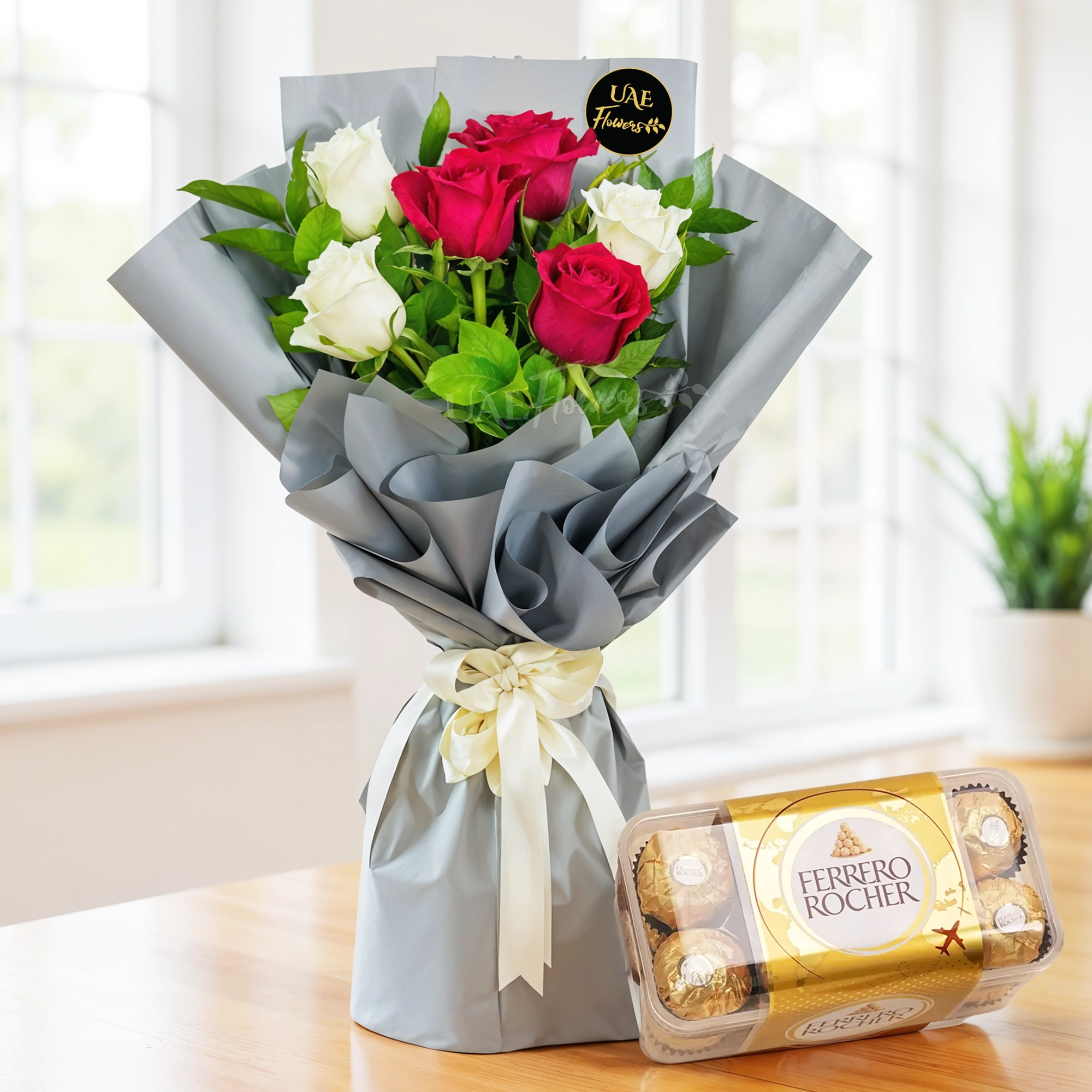 Bouquet of 6 red and white roses with 16pcs ferrero rocher chocolate.