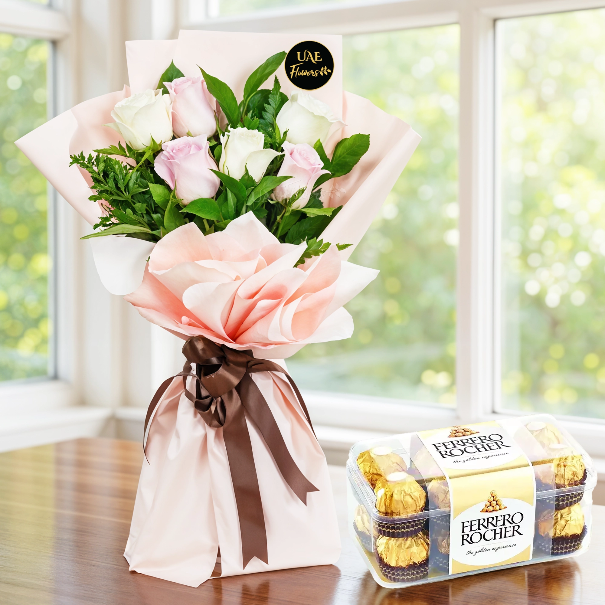 Bouquet of 6 pink and white roses with 16 pcs of ferrero rocher chocolate.