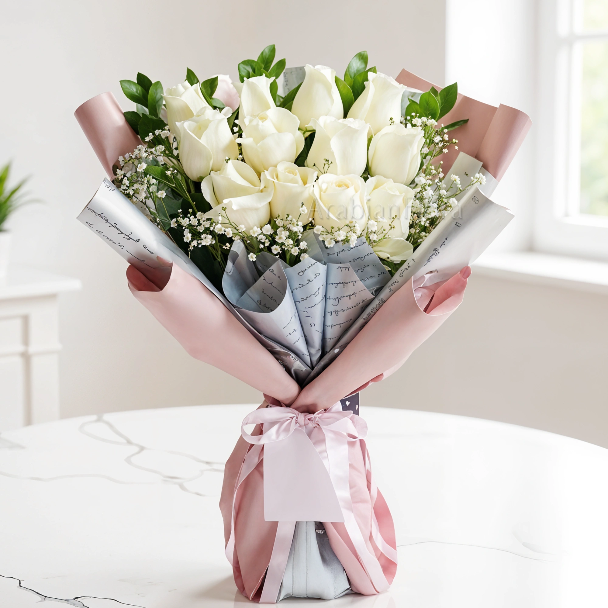 Bouquet of 12 white Roses with fillers in a nice wrapping