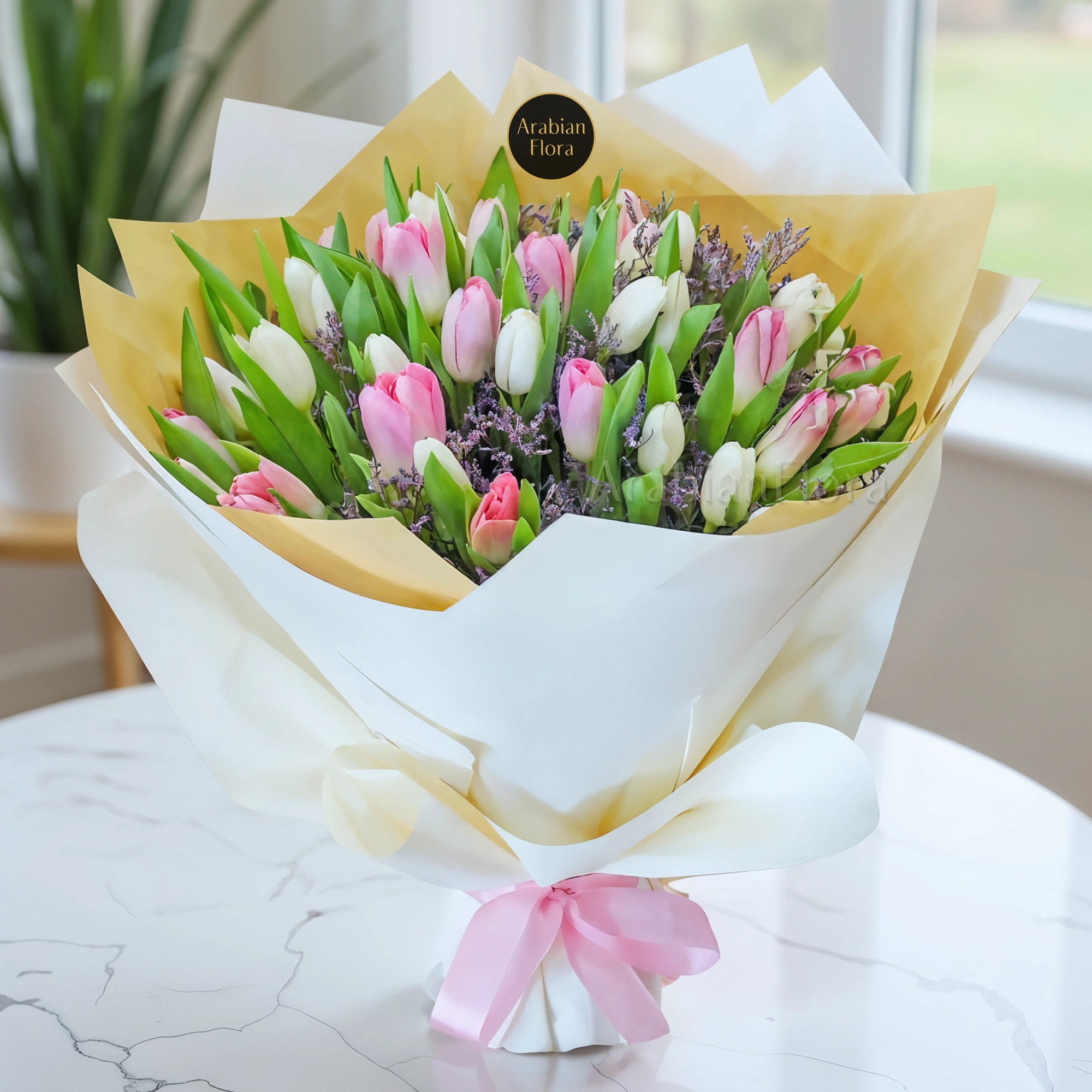 Bouquet of 15 Pink & 15 White Tulips with fillers in a nice wrapping