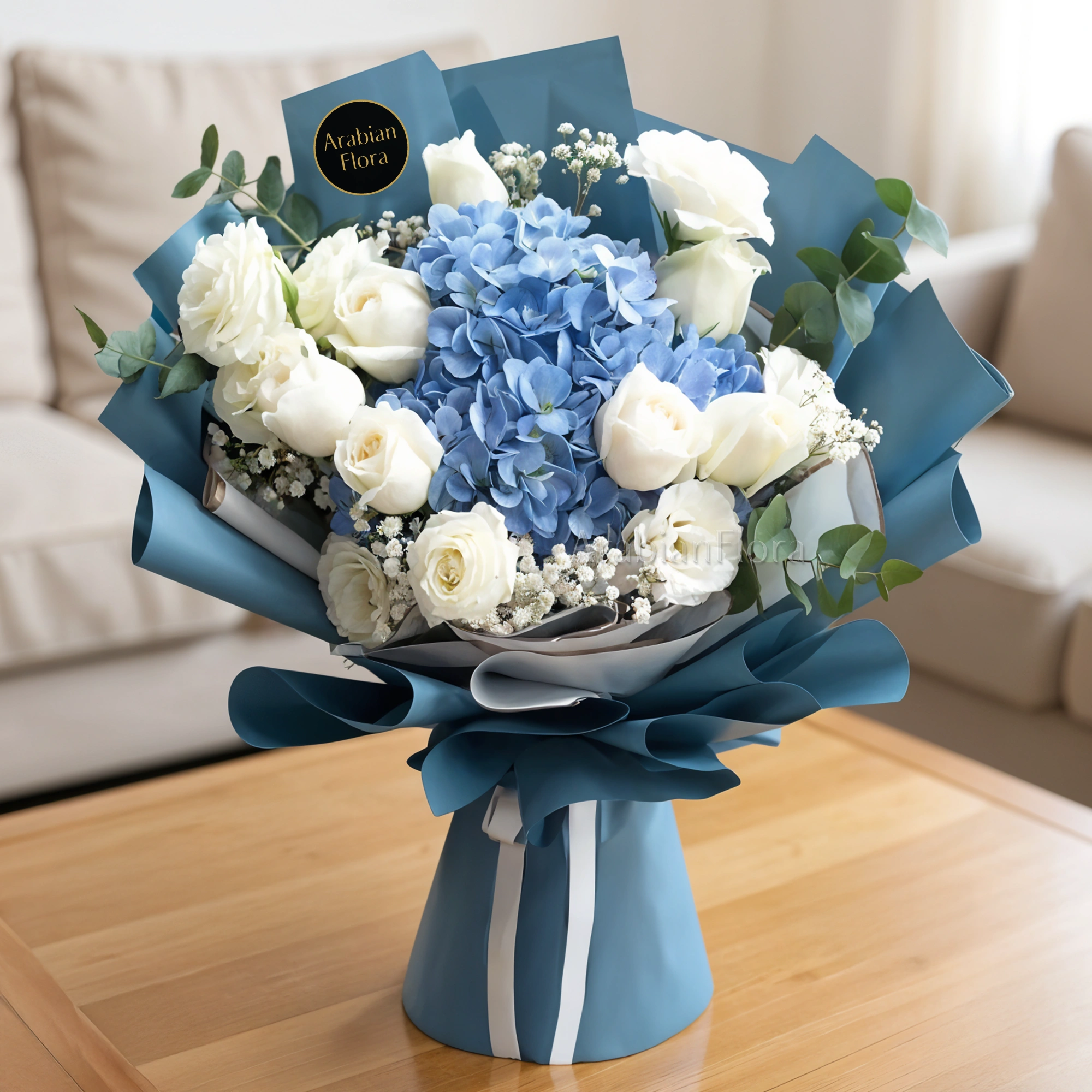 Bouquet of 1 Blue Hydrangea and 14 White Roses with baby breath in a nice wrapping.