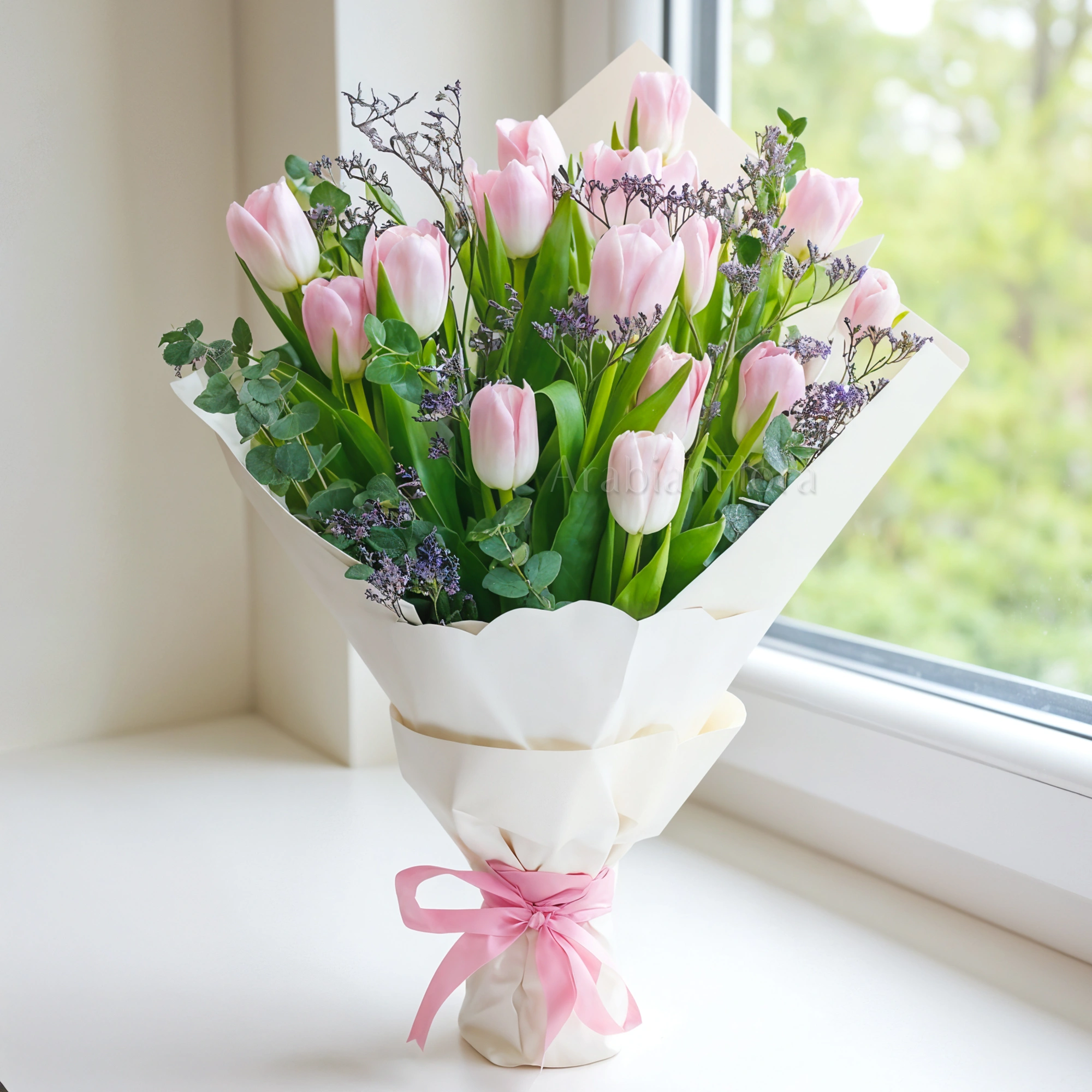 Bouquet of 15 Pink Tulips with greens in a nice wrapping