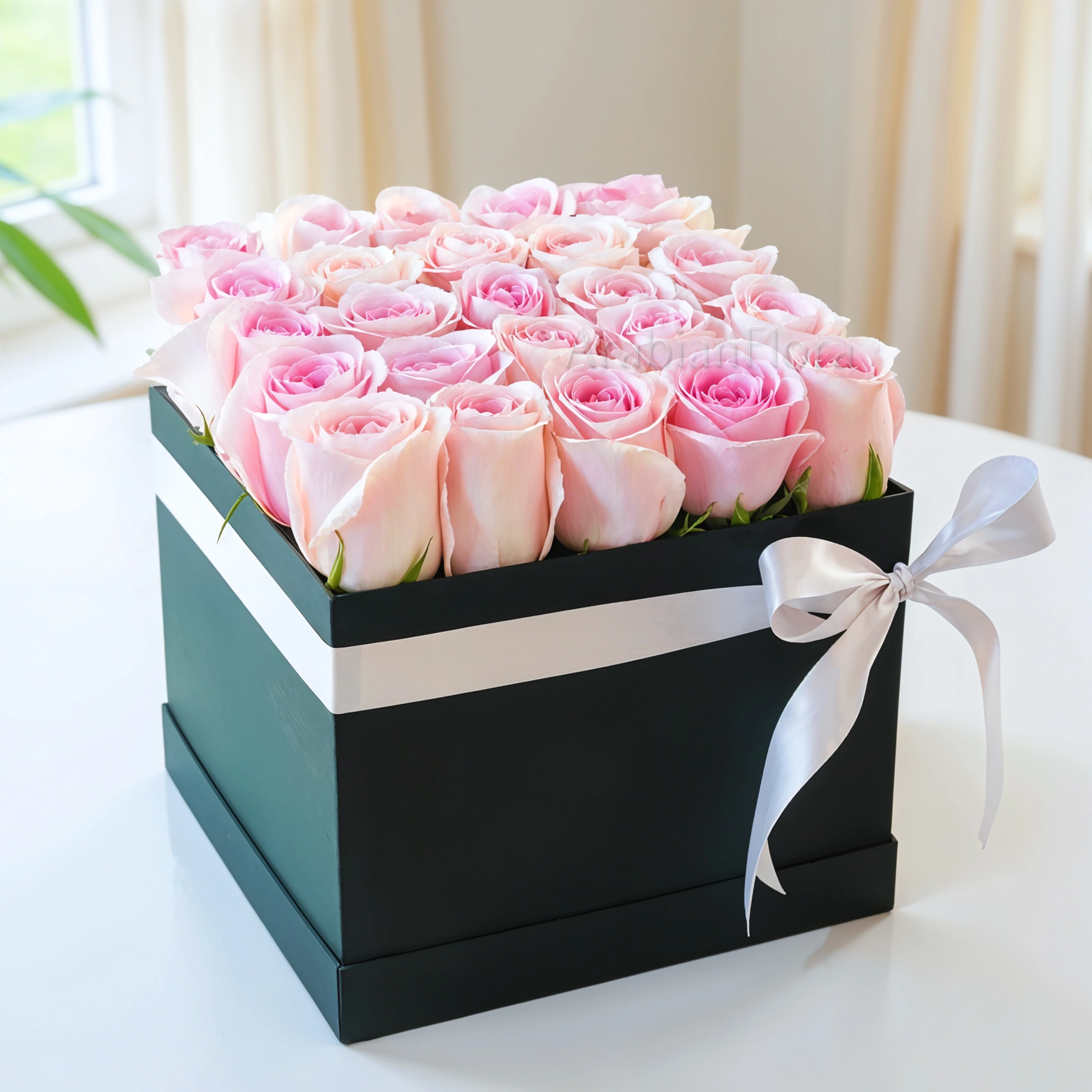 25 pink roses in a square box