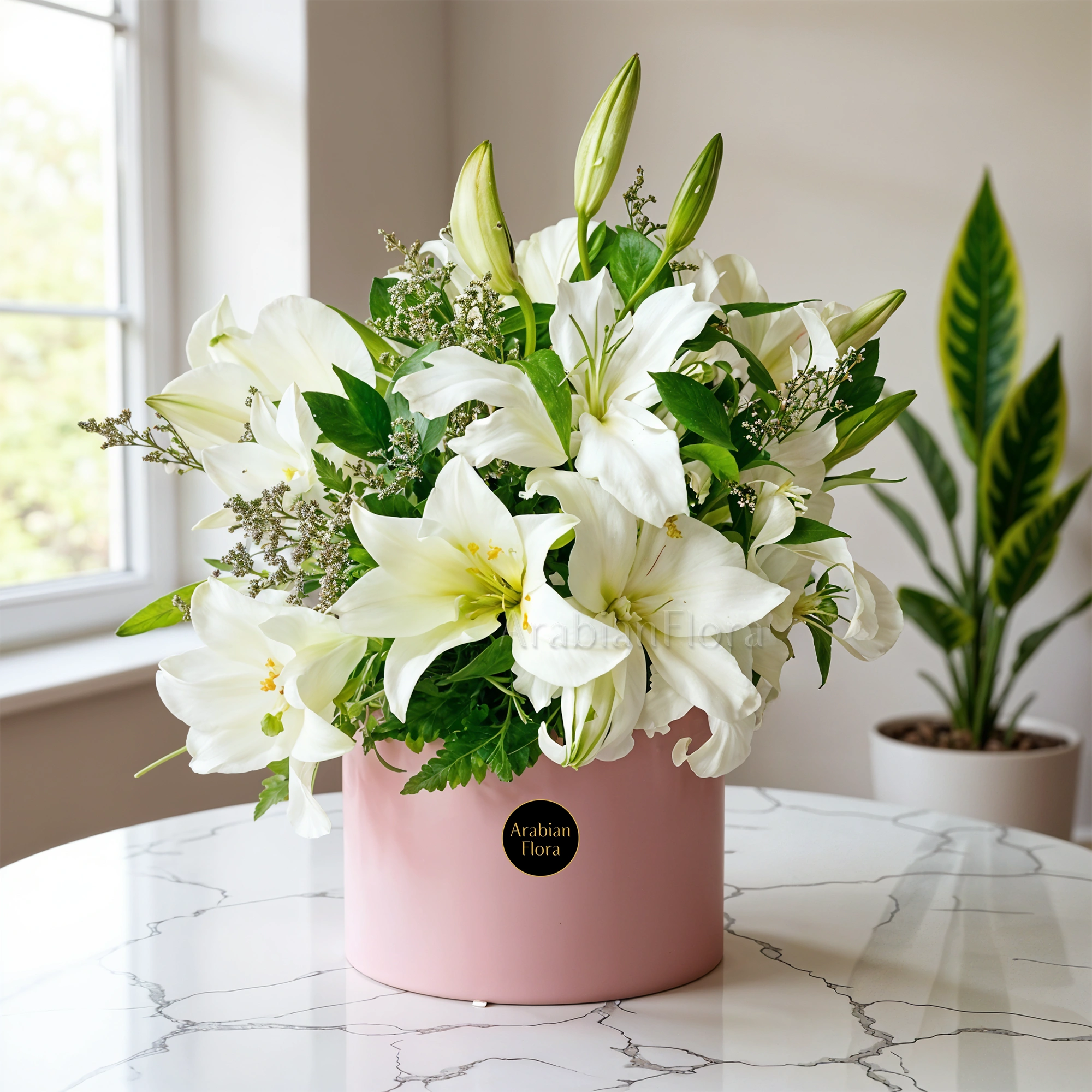 5 stems of White Lilies nicely arranged in a Box.