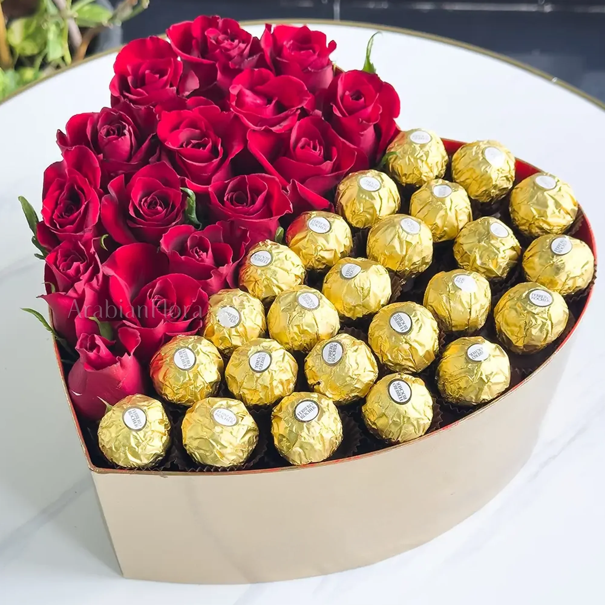 15 stems of red roses and 24 pcs ferrero rocher chocolate in heart shape box.
