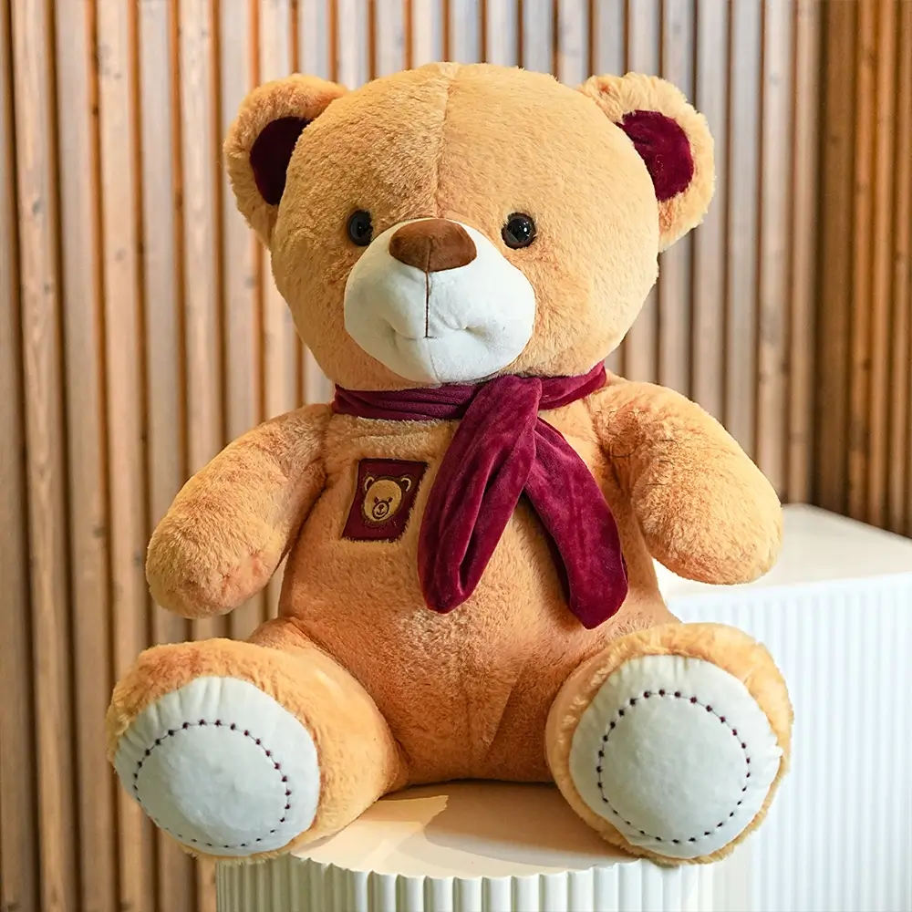 Bouquet of 6 red roses with limonium & green fillers in paper packing tied with ribbons with a small teddy bear and 24 pcs ferrero rocher chocolate.