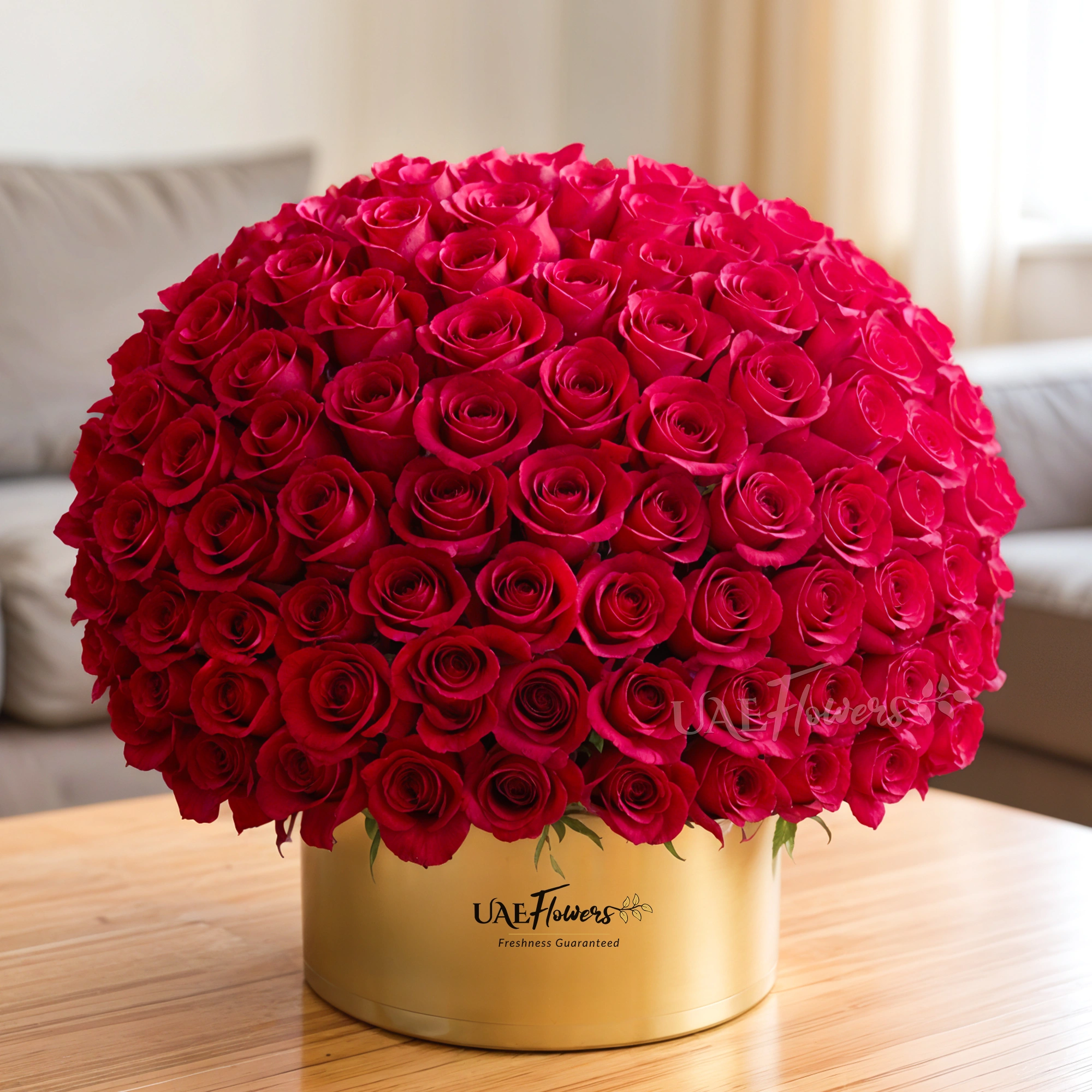 A box arrangement of 150 red roses