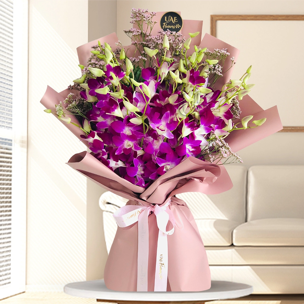 Bouquet of 20 stems of Purple Orchids with fillers in nice wrapping.
