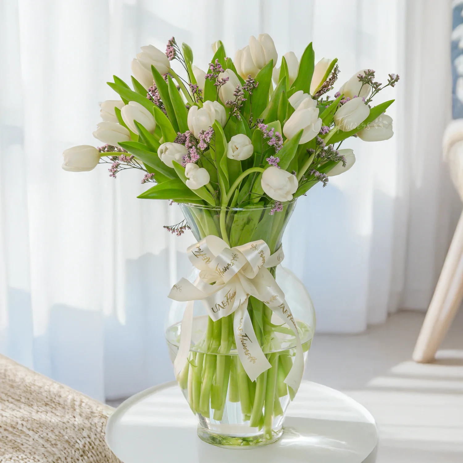 20 White Tulips in a vase