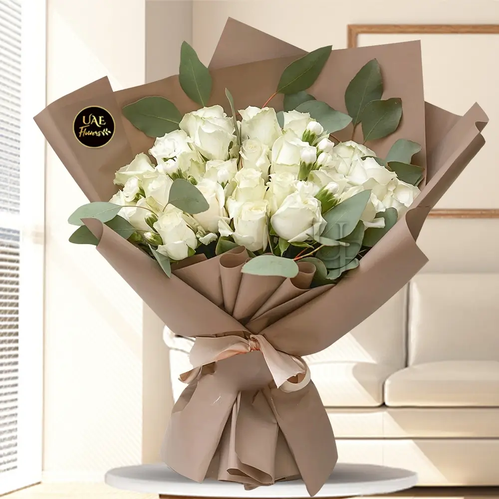 Bouquet of 20 stems of white roses with green fillers in nice wrapping