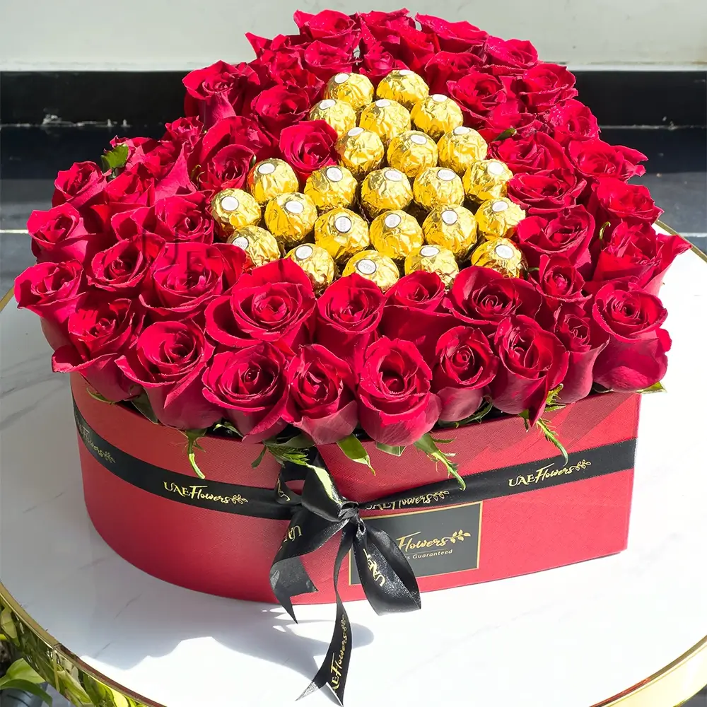 Heart-Shaped Arrangement of 50 Red Roses and 24 pcs Ferrero Rocher in a Black Box.
