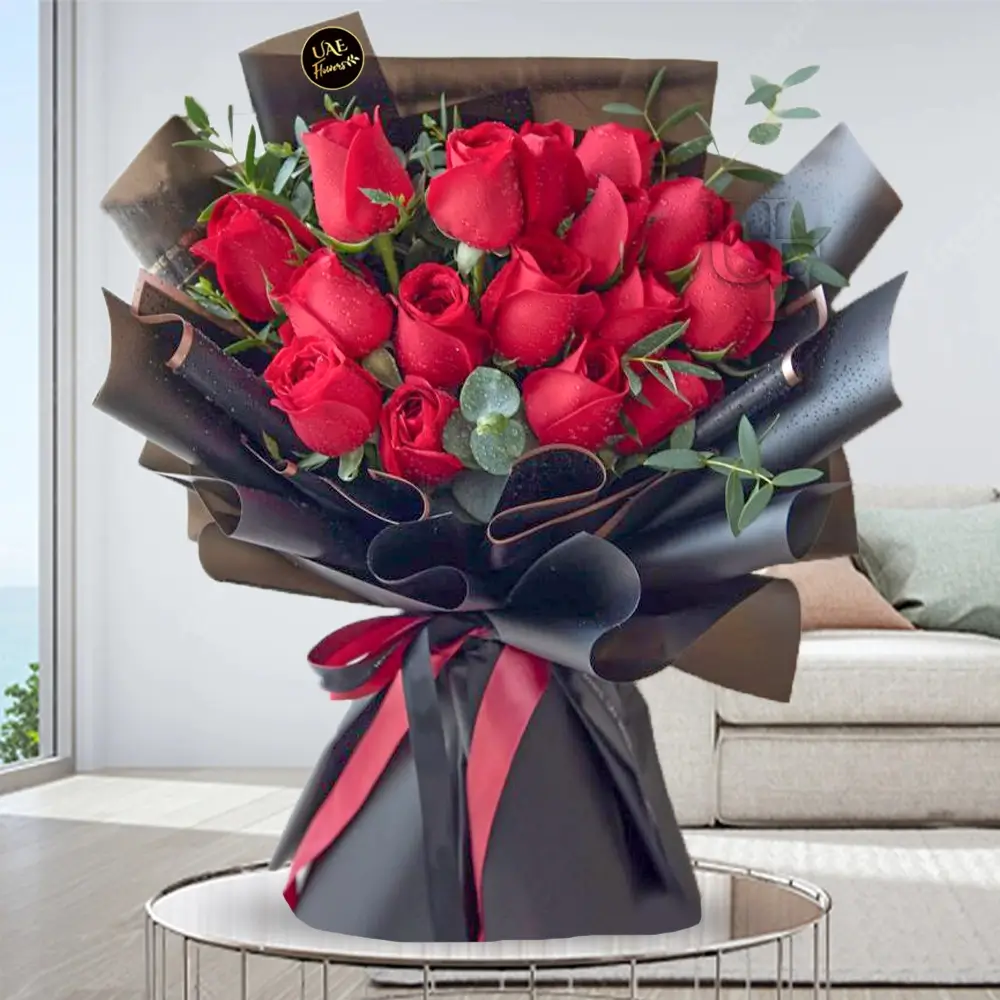 Bouquet of 12 Red Roses with fillers in a nice wrapping