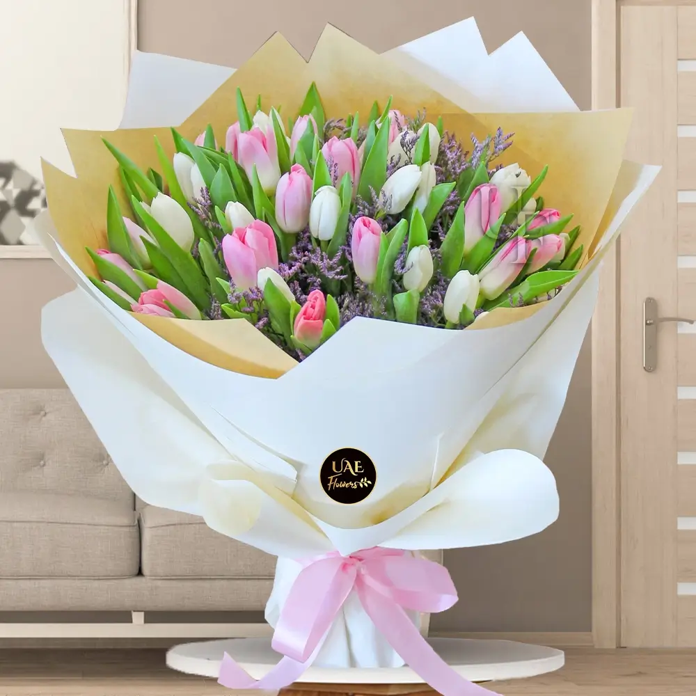 Bouquet of 15 Pink & 15 White Tulips with fillers in a nice wrapping