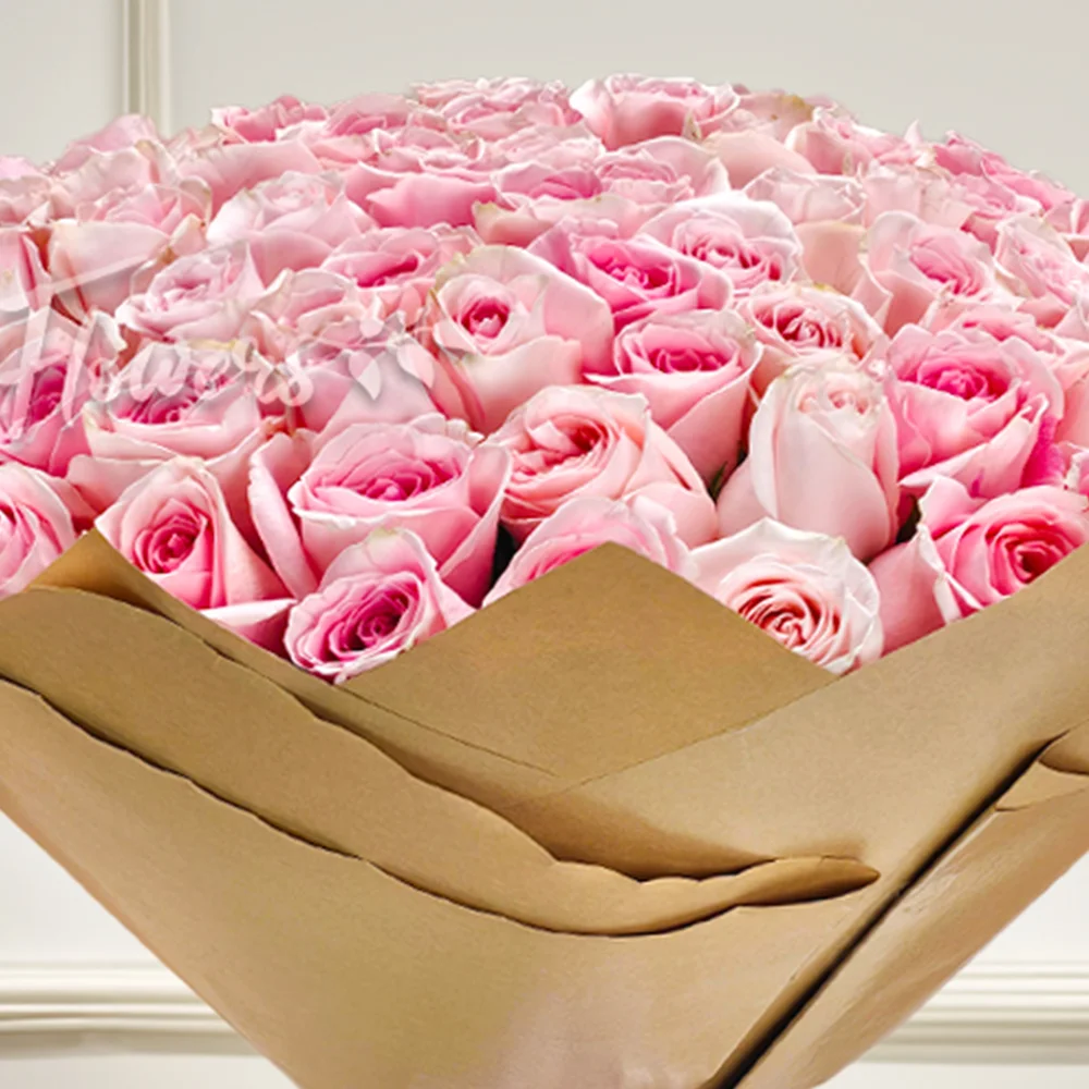 Bouquet of 100 Pink Roses in golden Wrapping Paper with Pink Ribbon.