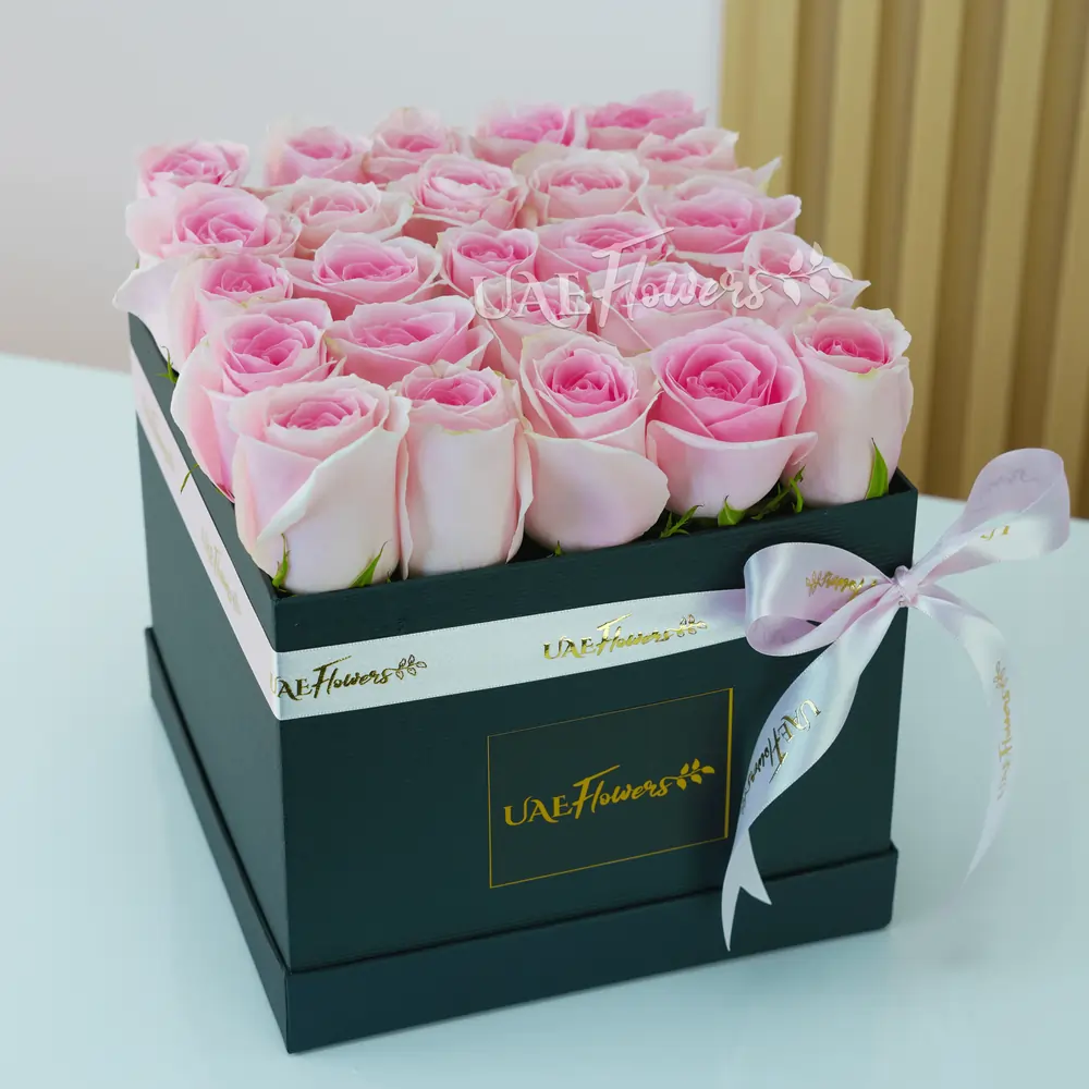 25 pink roses in a square box