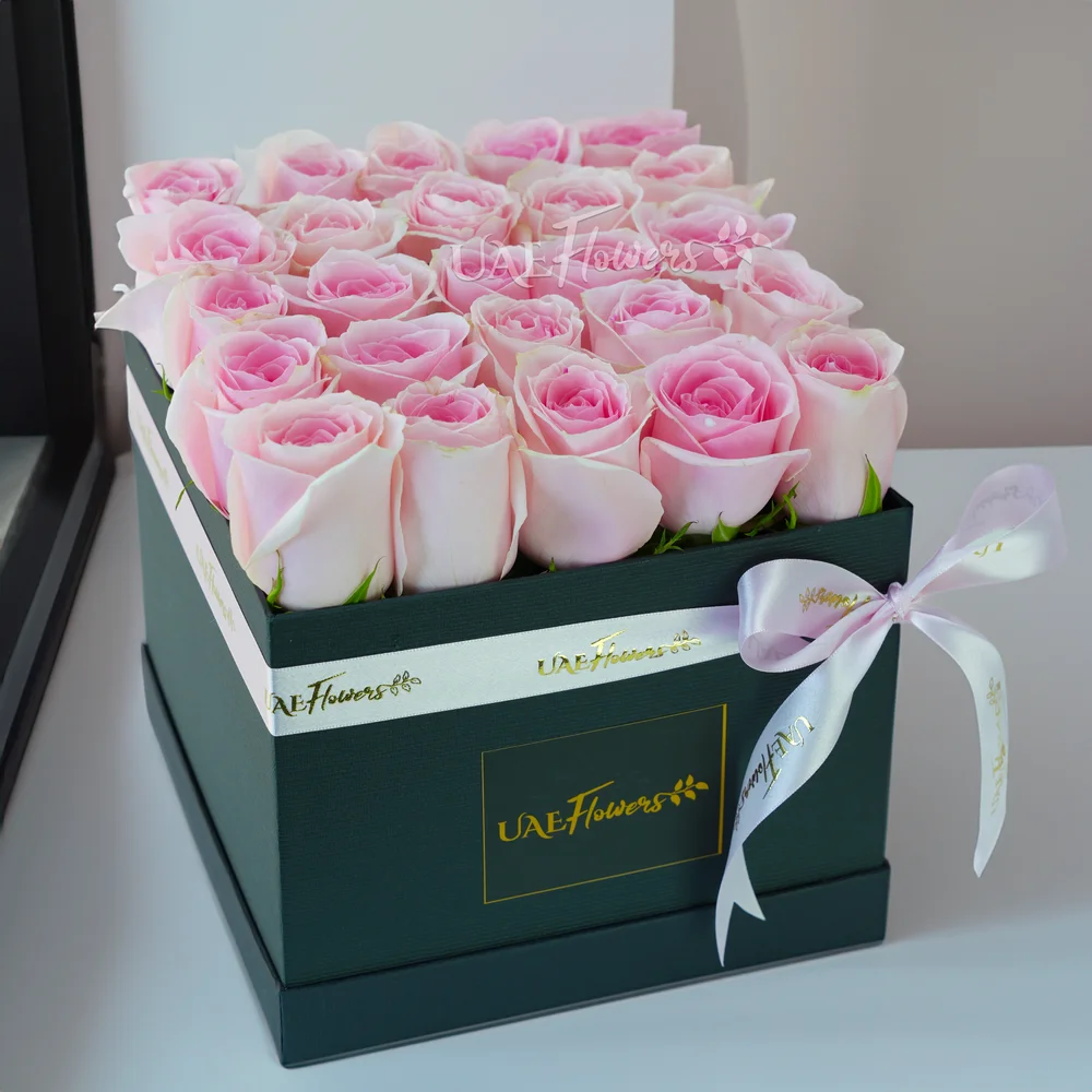 25 pink roses in a square box