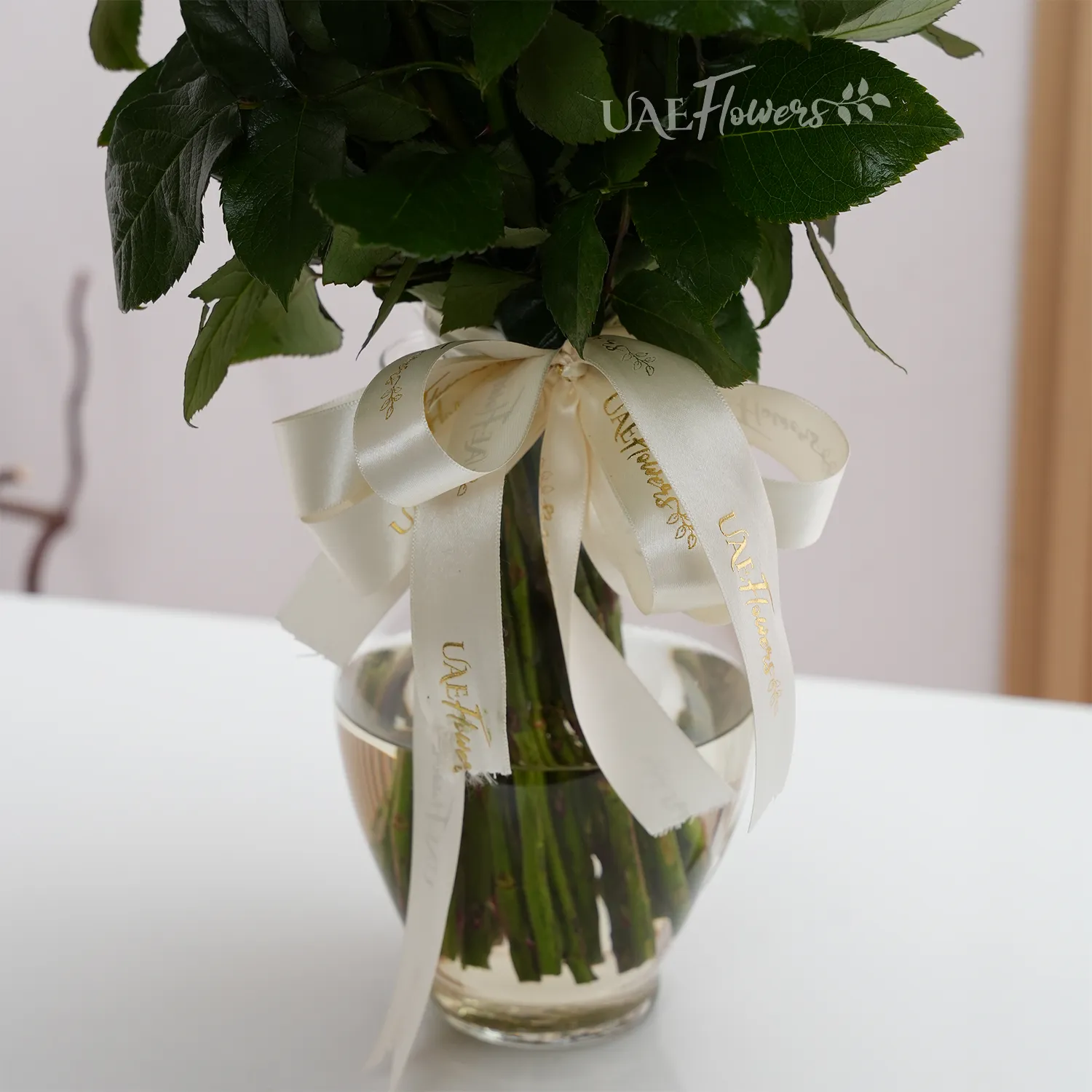 Glass vase of 30 White Roses with fillers