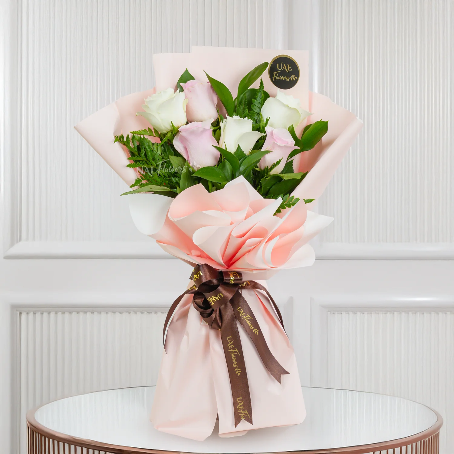 Bouquet ,6 pink & white roses with green fillers, ribbons.