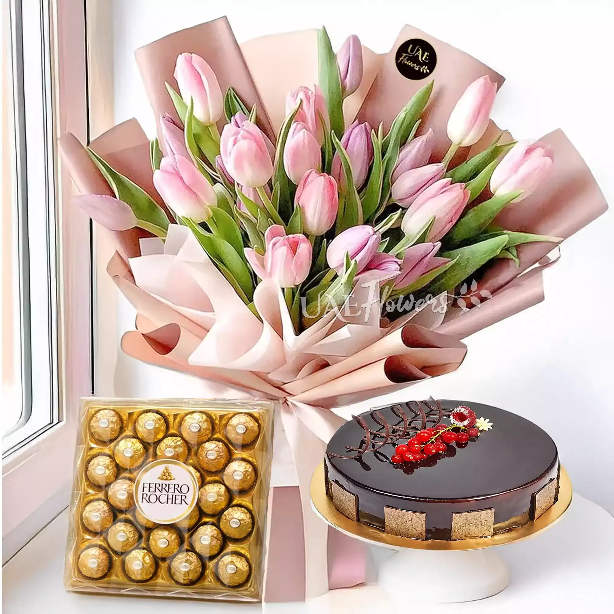 24 pcs of ferrero rocher chocolate, 1 kg chocolate cake, Bouquet of Pink Tulips