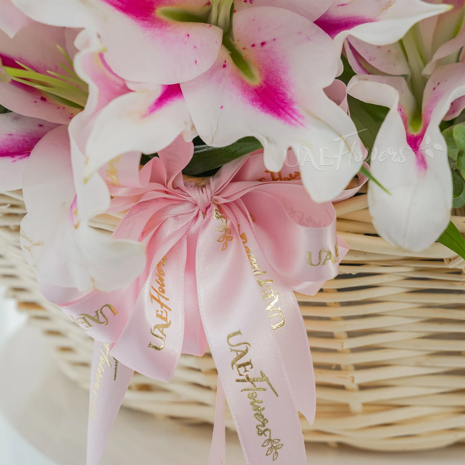 A basket of 30 pink lilies with green fillers.