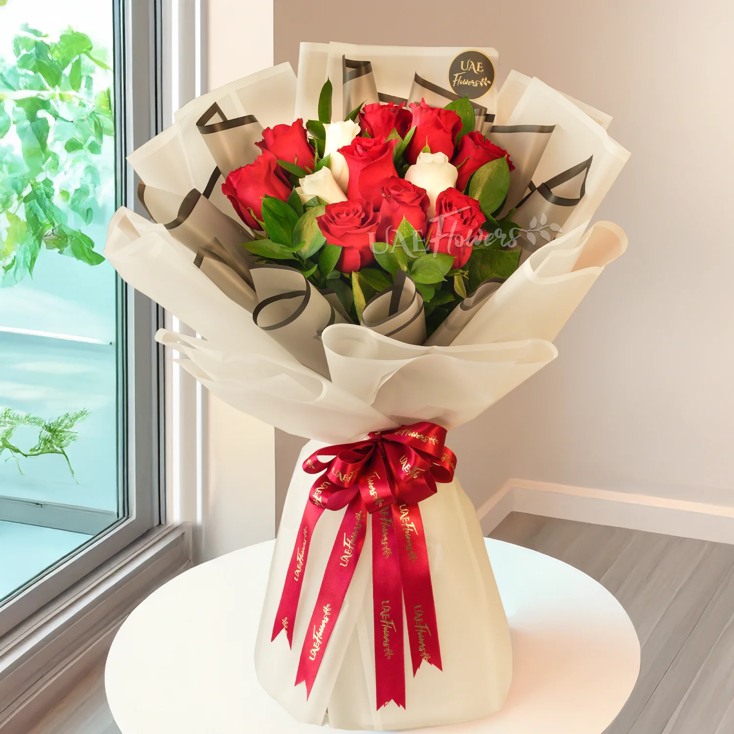 Bouquet, red roses, white roses, red ribbons.